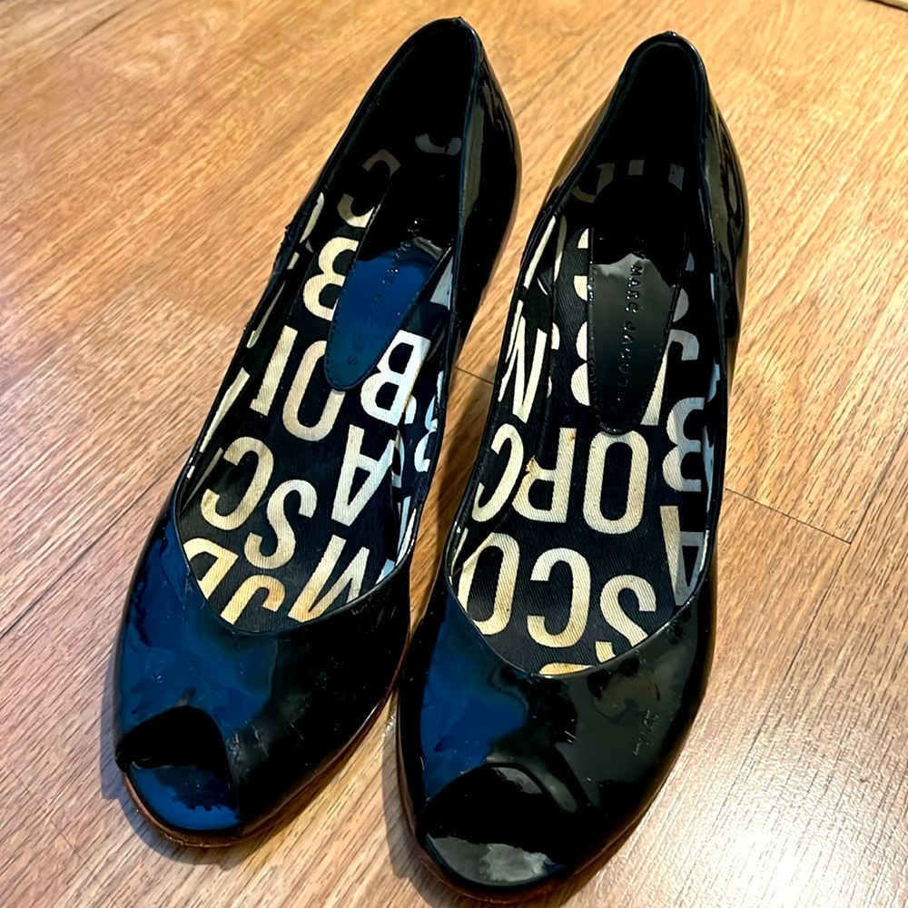These are Marc by Marc Jacobs black patent leather peep-toe pumps